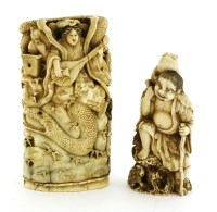 Lot 714 - Two Japanese walrus ivory okimono