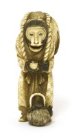 Lot 715 - A Japanese walrus ivory okimono