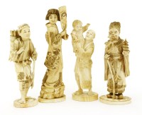 Lot 716 - A collection of three Japanese ivory okimono