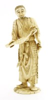 Lot 718 - A Japanese ivory okimono