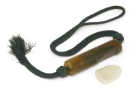 Lot 586 - A Chinese hardstone toggle