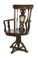 Lot 434 - A Chinese revolving captain's armchair