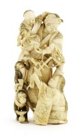 Lot 487 - A Japanese ivory okimono