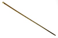 Lot 335 - A gold-mounted rhinoceros horn walking stick