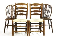 Lot 620 - A pair of 18th century elm side chairs