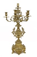 Lot 311 - A continental gilt metal light candelabra