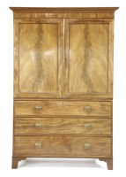 Lot 615 - A Georgian mahogany linen press