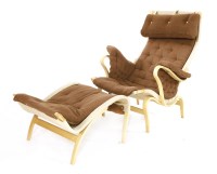 Lot 501 - A 'Pernilla' armchair and ottoman
