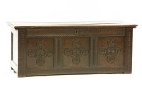 Lot 557 - An 18th century oak coffer