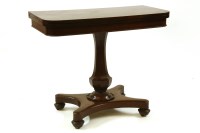 Lot 652 - An early 19th century mahogany fold over tea table