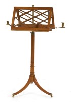 Lot 840 - A Regency satinwood duet stand