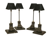 Lot 713 - A set of four table lamps