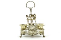 Lot 153 - A silver plated six piece egg cruet stand