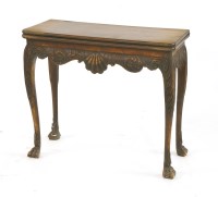 Lot 511 - An Irish mahogany fold-over card table