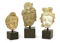 Lot 416 - Three stucco heads