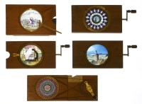 Lot 350 - Five mechanical magic lanterns slides