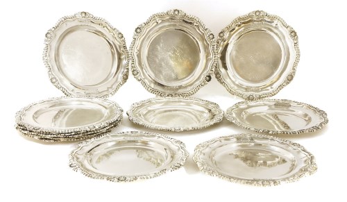Lot 179 - A set of twelve William IV silver dinner plates