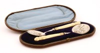 Lot 171 - A rare pair of silver Victorian seafood serving spoons