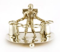 Lot 117 - A electroplated cigar stand and vesta holder