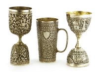 Lot 189 - A chota peg and burra peg Indian silver measure