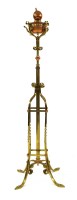 Lot 71 - An Arts and Crafts copper and brass adjustable standard lamp