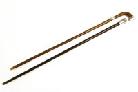 Lot 477 - Two silver topped walking canes