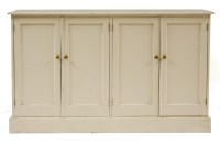 Lot 630 - A painted pine cupboard