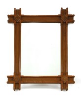 Lot 765 - A Victorian Gothic oak wall mirror