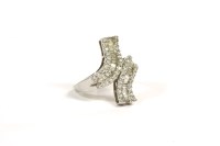 Lot 3 - A white gold diamond set crossover ring