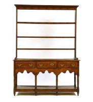 Lot 649 - A George III oak dresser