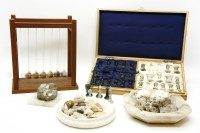 Lot 387 - A hard stone chess set
