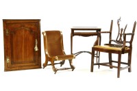 Lot 631 - An oak hanging corner cabinet