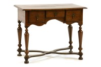 Lot 614 - A late 17th century/early 18th century oak lowboy