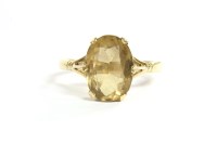 Lot 38 - A single stone oval cut citrine ring