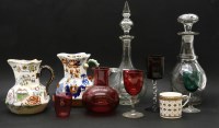 Lot 365 - A cranberry glass jug