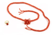 Lot 11A - A single stone coral bead ring