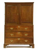 Lot 422 - A George III oak press cupboard