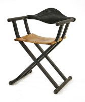 Lot 433 - A contemporary ebonised ash armchair