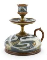 Lot 135 - A Doulton Lambeth stoneware chamberstick