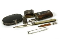 Lot 68 - A tortoiseshell etui with silver inlay