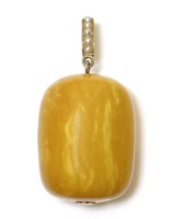 Lot 299 - A late Victorian amber and split pearl pendant