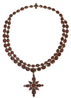Lot 278 - A late 18th century two row garnet set rivière with a garnet set cruciform pendant