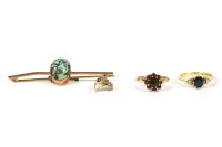 Lot 5 - An 18ct gold three stone sapphire and diamond ring