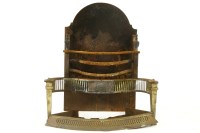 Lot 573 - A Regency serpentine fire basket
