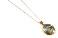 Lot 156 - A gold picture locket