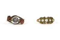 Lot 115 - An 18ct gold graduated split pearl and emerald cluster ring