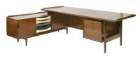 Lot 424 - A Danish rosewood desk with sideboard