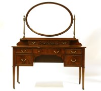 Lot 558 - An Edwardian mahogany drawing table