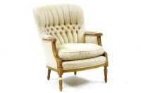 Lot 565 - A show frame button back armchair