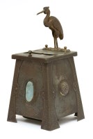 Lot 95 - An Art Nouveau tinplate cigarette dispenser